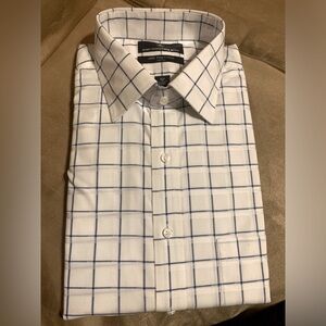 Men’s blue and white checkered long sleeve shirt with chest pocket.